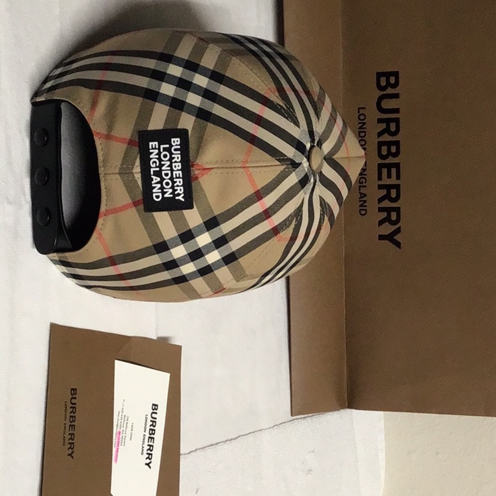 Selling my Burberry baseball cap new condition. Extra large but adjustable
